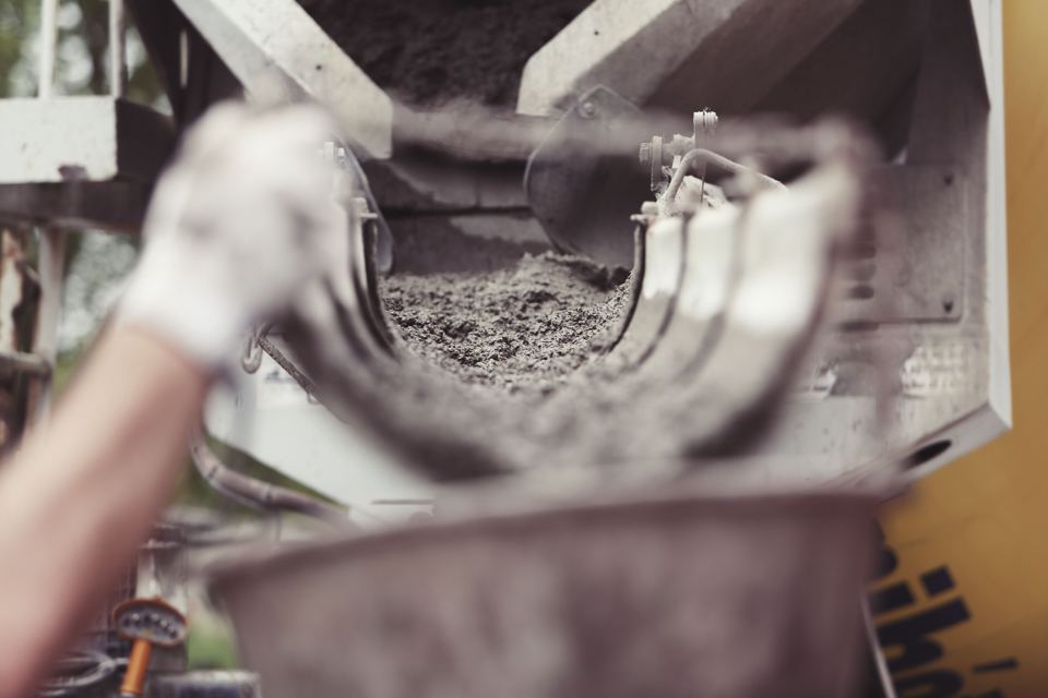Concrete placement process shown for illustration; not a listed provider